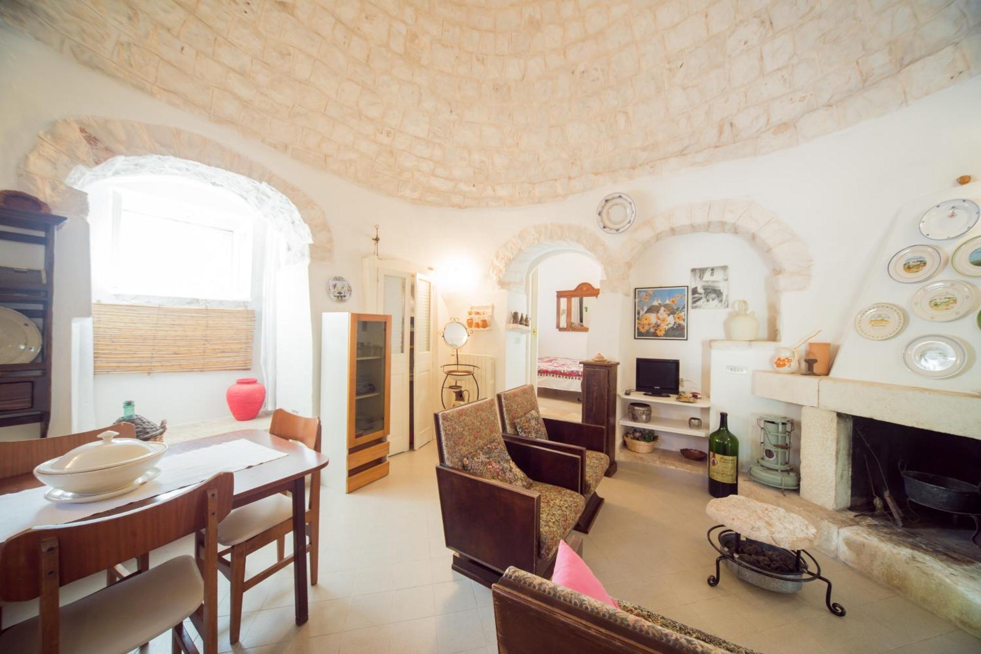 Trulli Girasoli E Viole Cocolicchio Pokoj fotografie